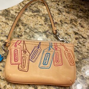 Coach Beige Wristlet with Colorful Tag Accents